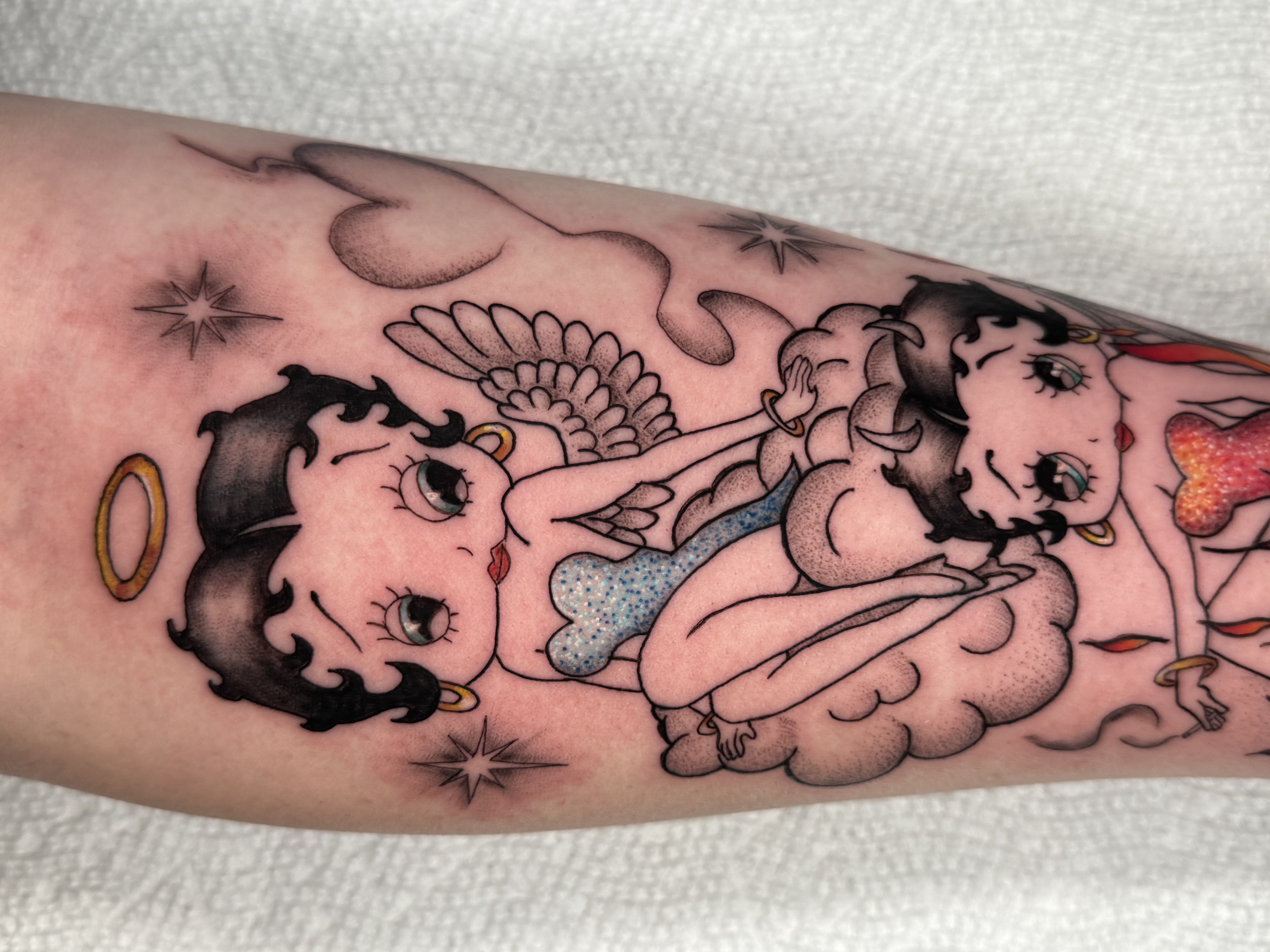 Betty Boop style angel and devil cartoon characters tattoo